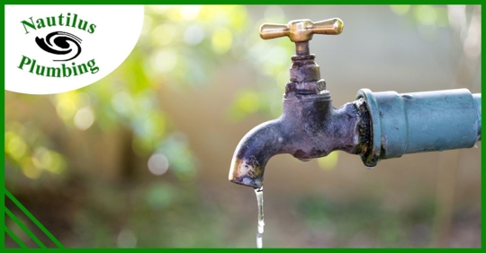 Outdoor faucet dripping.