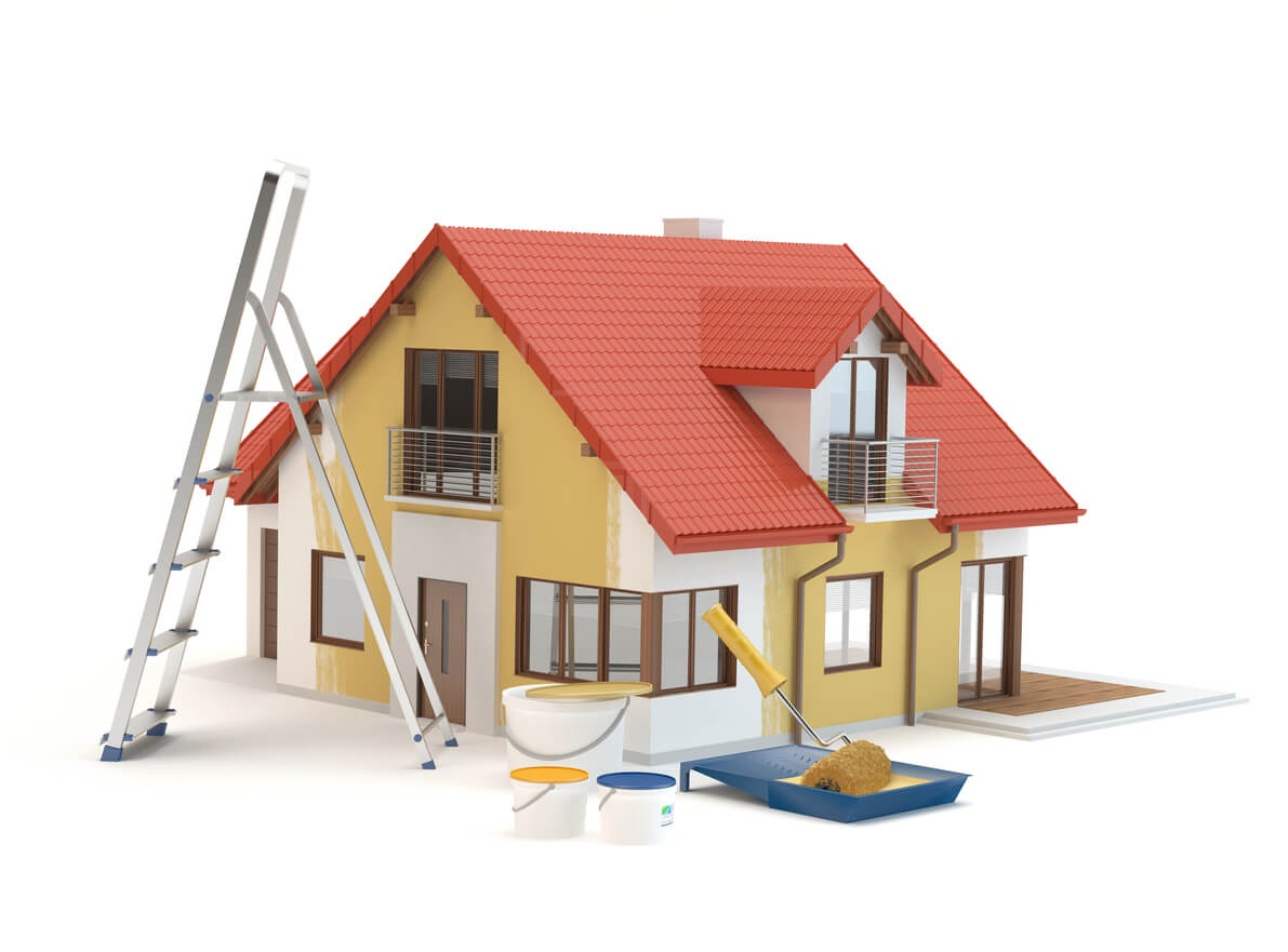 A house being painted mustard yellow with a red roof. There is a ladder in front of the house and painting equipment on the ground.