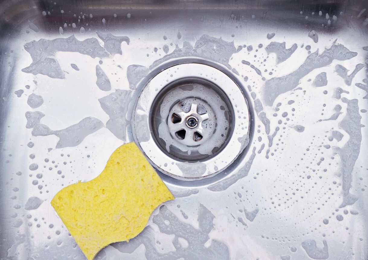 Drain with Yellow Sponge and Soap